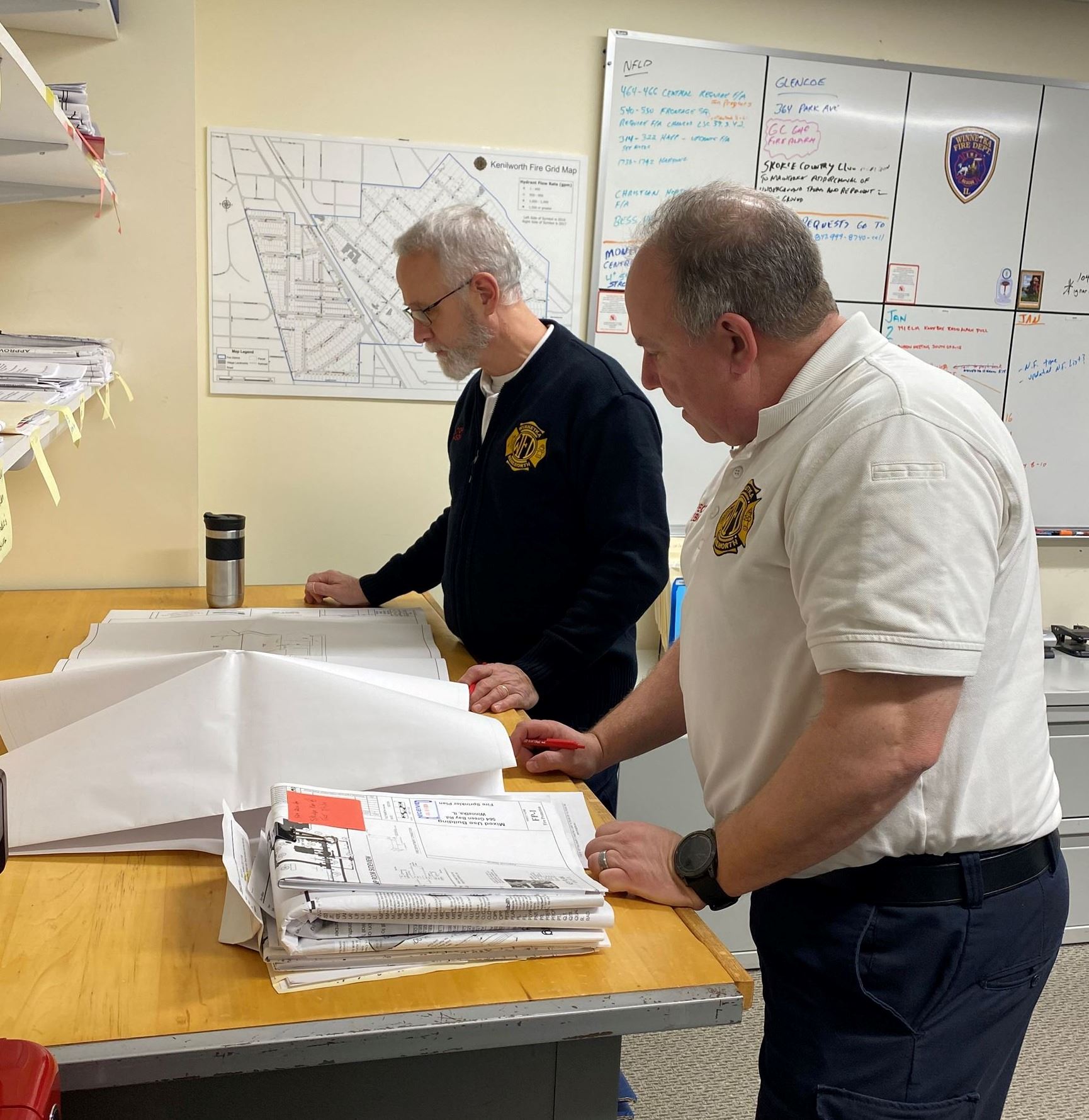 Inspectors reviewing sprinkler plans